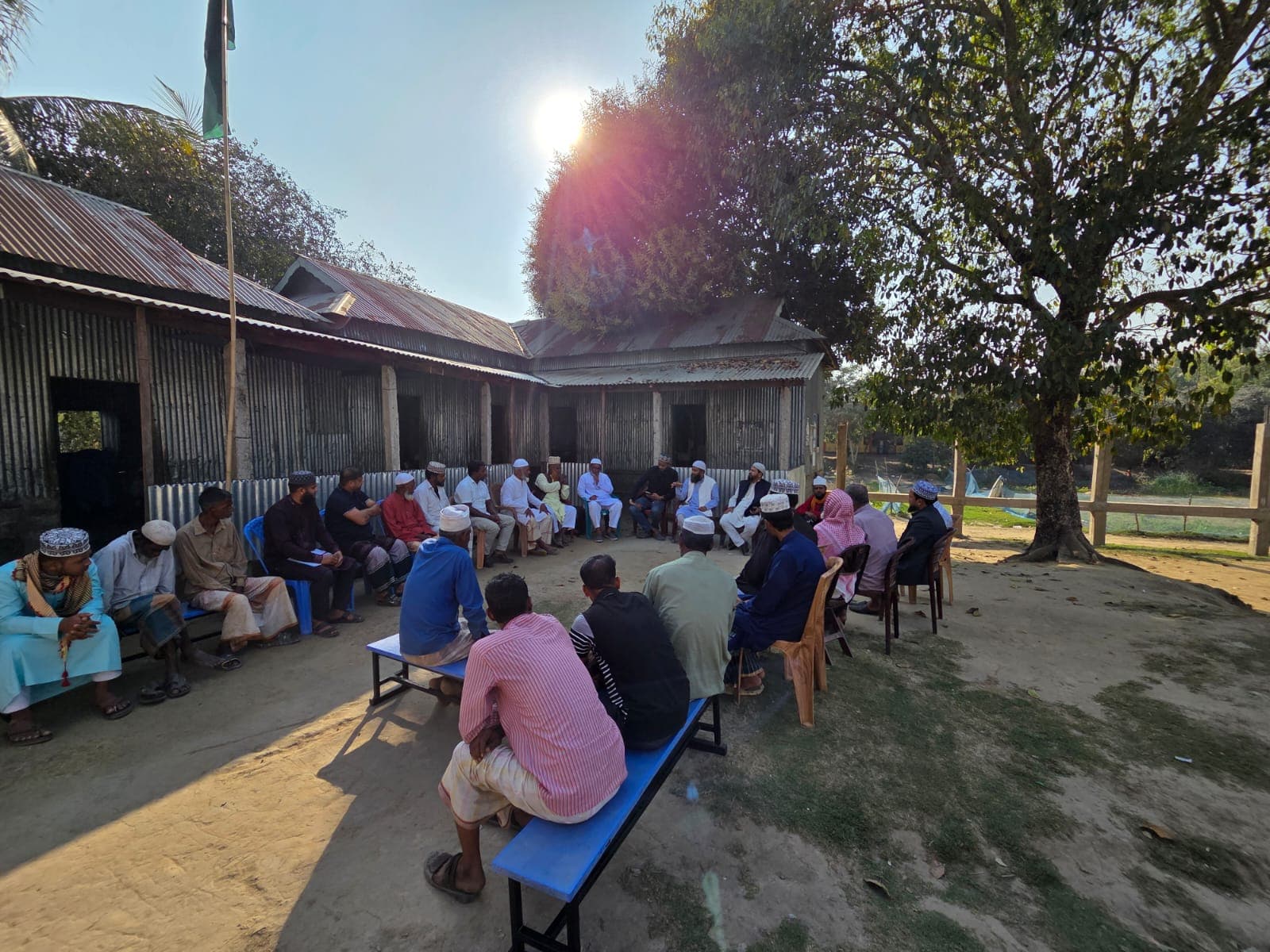 Local residents and leaders meeting to plan welfare work at the village level.